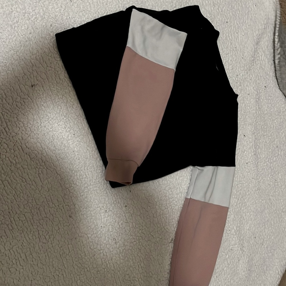 Long sleeve, mid cut lightweight sweater